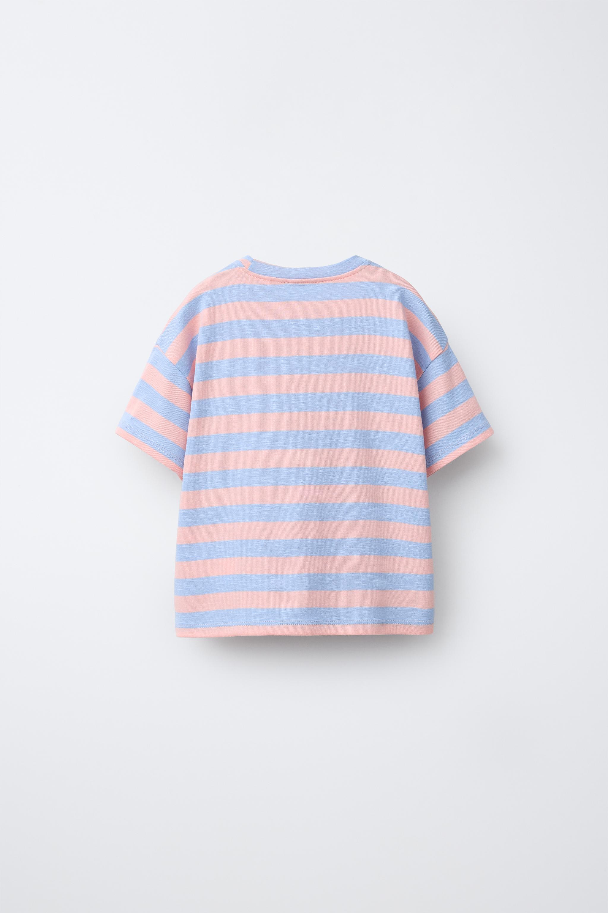 T-SHIRT À RAYURES AVEC PIÈCE FLEURIE